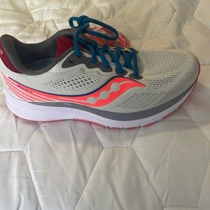 Jackrabbit with Saucony athletic shoes. Brand new with box.